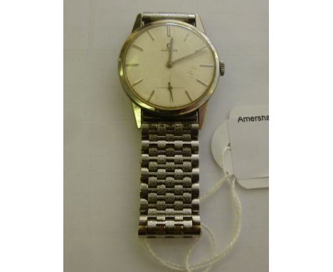 A gentleman's stainless steel cased Omega wristwatch, faced by a cream coloured enamel baton dial        11