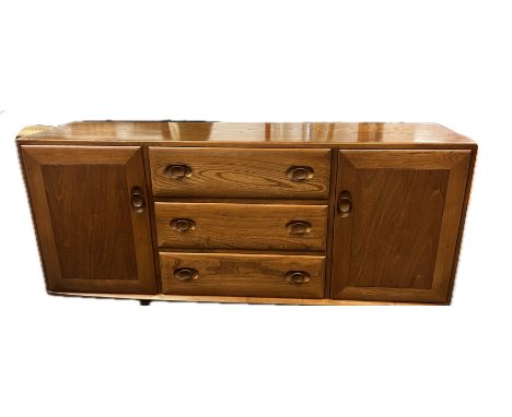 Ercol windsor buffet sideboard with central cutlery draw on casters 68cm x 156cm x 44 cm