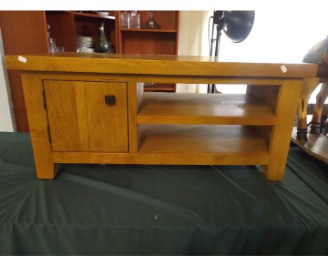 A Modern Coffee Table with Under Shelf and Cupboard. 