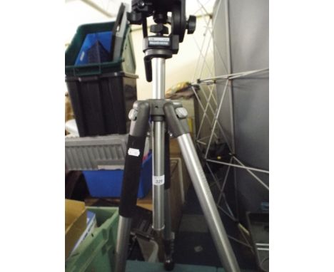 A Manfrotto Camera Tripod. 