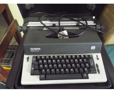 An Olympia Report Deluxe Typewriter. 