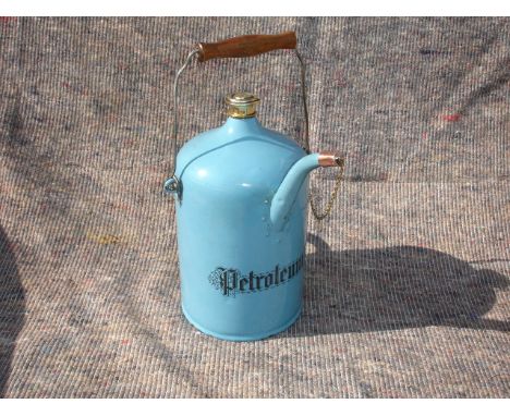 An early 3 litre engine priming tap filling Kettle in Indian blue stove enamel of c1898 with decorative Petroleum graphics on