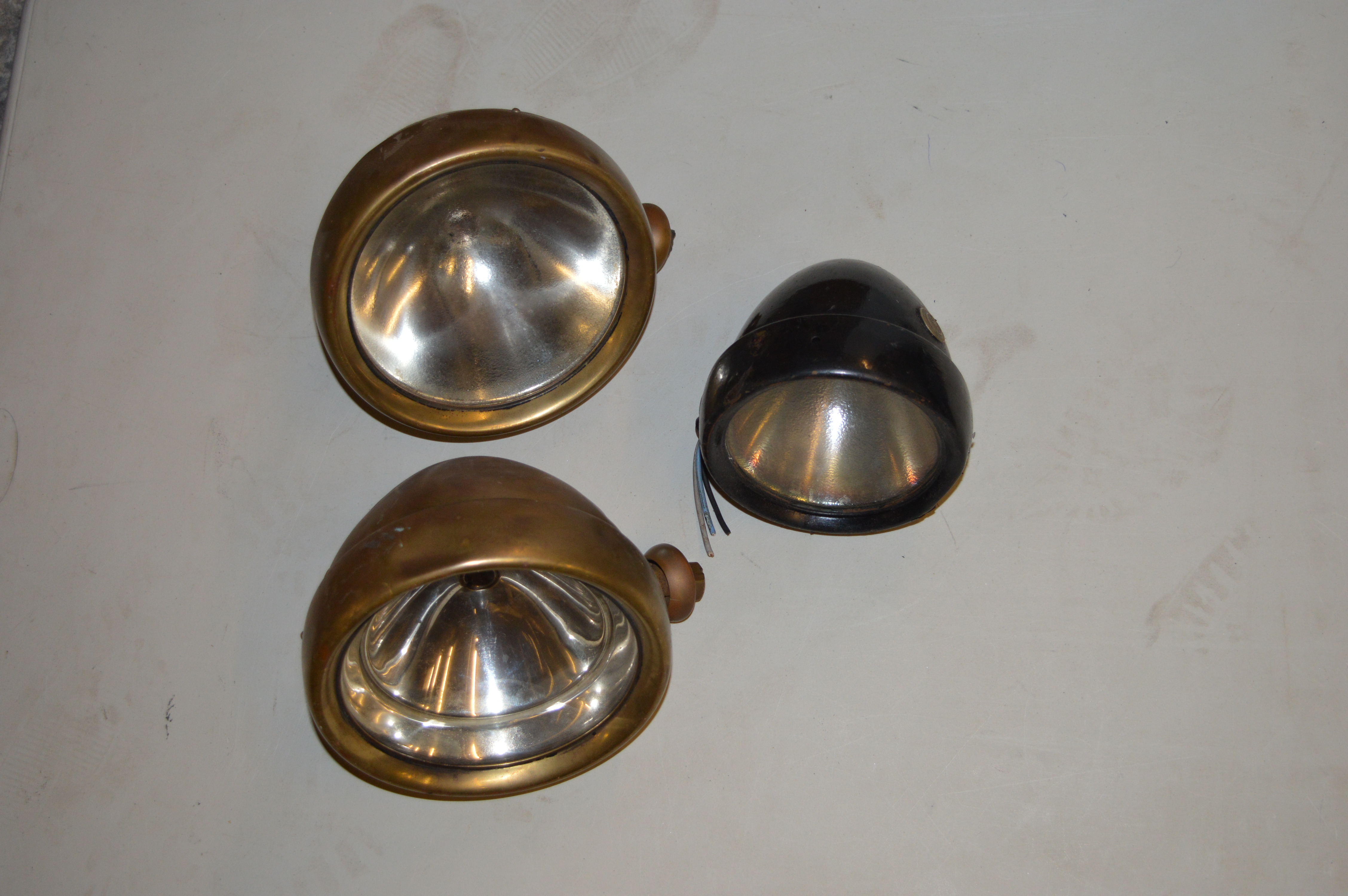 A pair of Lucas 6in R40 Headlights, one with dipping mechanism, plus