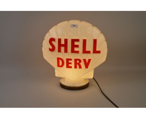 An illuminating Shell Derv glass Petrol Globe