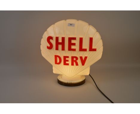 An illuminating Shell Derv glass Petrol Globe