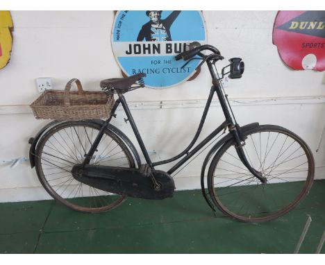 An early Hopper loop framed Bicycle with front lamp