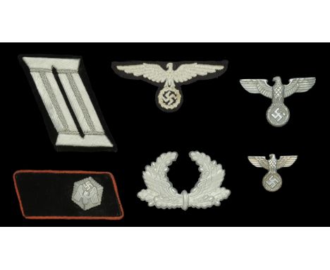 A German Second War Railway Protection Police Insignia Grouping. NCOs Railway Protection Police arm eagle, heavily silver cot