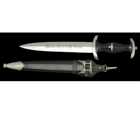 A German Second War S.S. M33 Enlisted Mans Dagger. A nice condition SS M33 dagger, the blade being double stamped with the lo