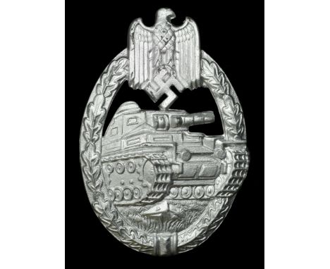 A German Second War Panzer Assault Badge in Silver. An absolutely unused condition one-piece stamped Panzer Assault Badge in 