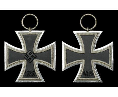 A German Second War Iron Cross Second Class. An absolutely mint Iron Cross Second Class, cased in its presentation box. Silve