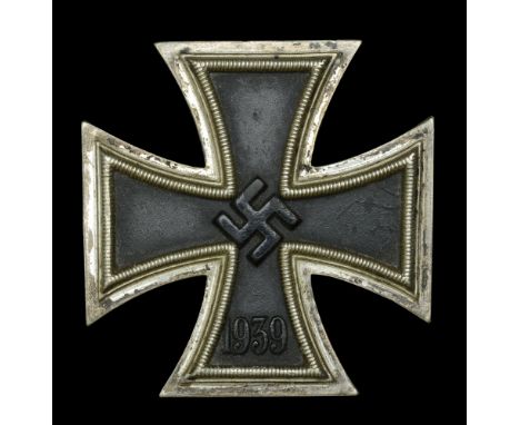 A German Second War Iron Cross First Class. A good clean example of a non maker marked Iron Cross First Class. All the blacke