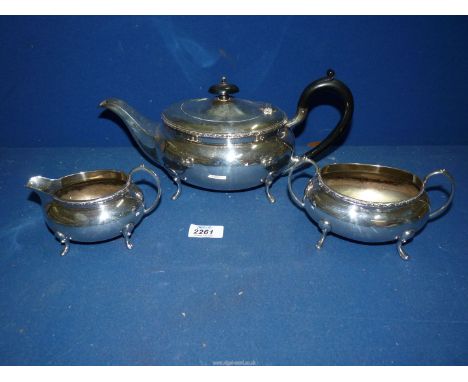 An Epns Teaset including teapot with Bakelite finial and handle, milk jug and sugar bowl.