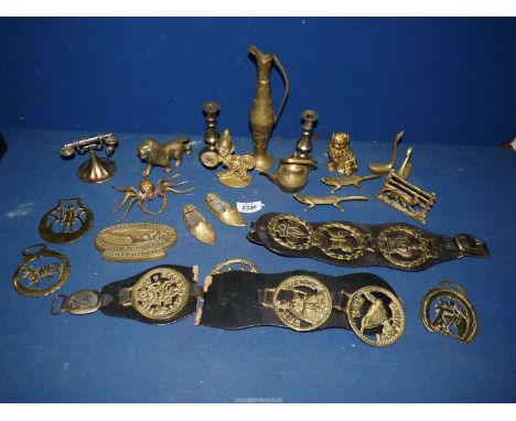 An old "Black Magic" tin of brass ornaments, martingales, etc.