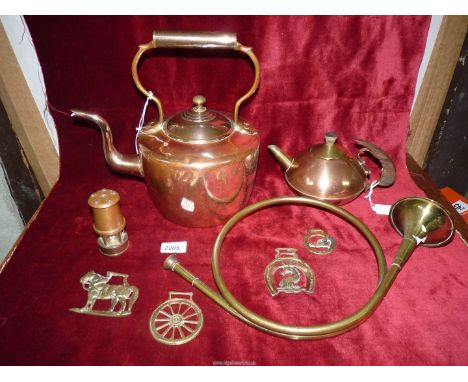 A large 19th century Copper kettle, four horse brasses, small miner's lamp, copper French horn and an Arts and crafts teapot.