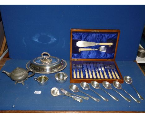 An Atkin Bros. Victorian pewter Teapot, six silver plated soup spoons, serving ladle and fork, cased set of six silver plated