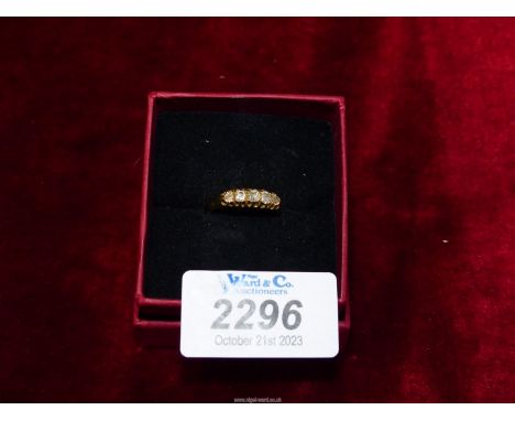 An 18ct gold Engagement ring set with five diamonds, London. Size M.