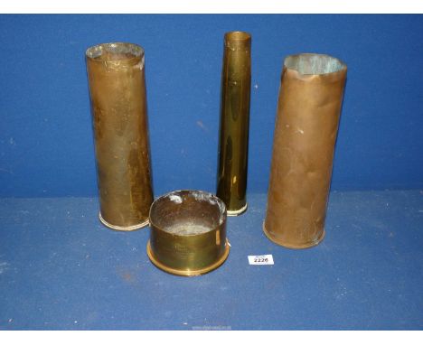 Four brass gun shells; one inscribed 'From John Walford May 1916', etc.