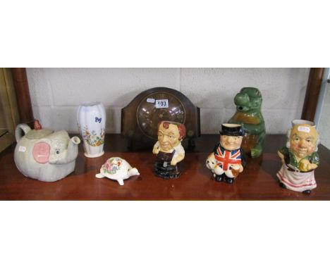 Shelf of collectables to include Carlton ware teapots