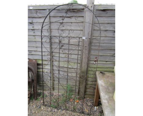 Tall wrought iron garden gate