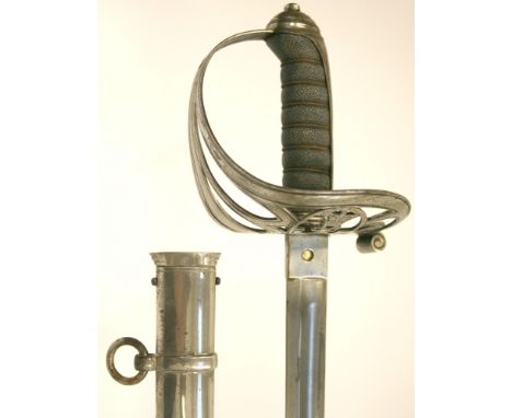 British 1827 Pattern Rifle Officers Sword complete with its original dress scabbard. Strung bugle badge to the hilt. Fish ski