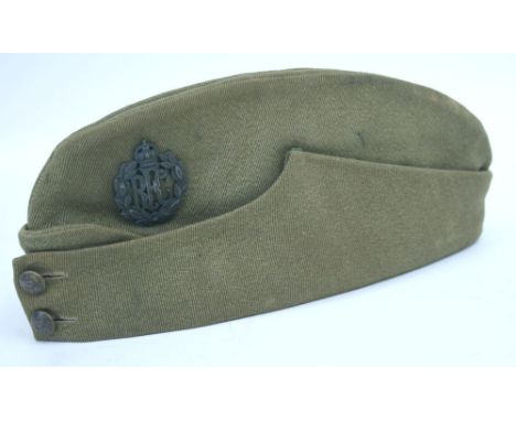 Royal Flying Corps Officers Side Cap fitted with a later bronze officers cap badge. Front of the cap has original officers si