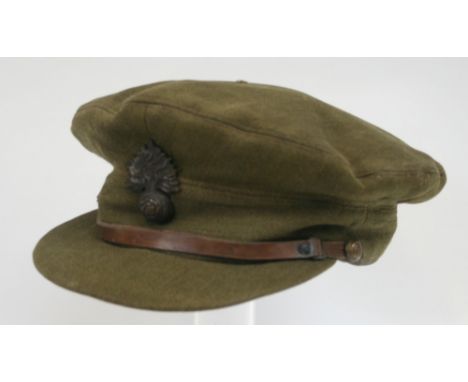 WW1 British Officers Peaked Cap complete with officer bronze cap badge of the Royal Fusiliers. Typical 1917 /1918 period cons