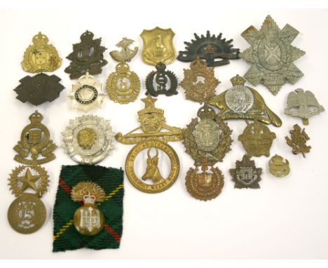 Selection of Colonial Cap Badges of various regiments including Three Rivers Regiment, Fort Garry Horse (collar badge) with p