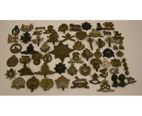 Selection of British Regimental Badges consisting of mostly cap and collar badges with some shoulder titles and other items. 