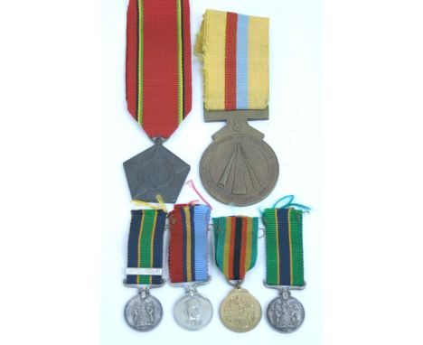 Rhodesian & Zimbabwe Medals consisting of full size bronze grade Zimbabwe Independence medal, Defence of Zimbabwe Economic Li