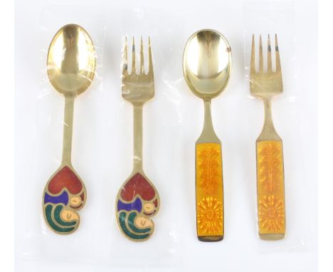 A lot to include two Danish silver gilt and enamel fork and spoon sets by A. Michelsen, one set depicting mother and child, r