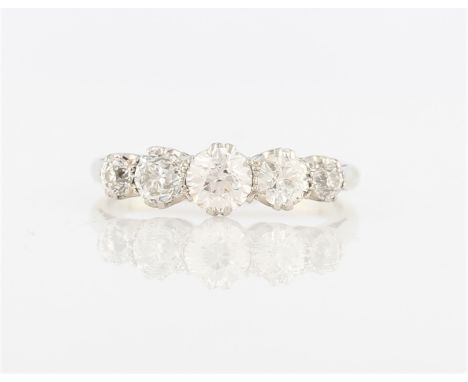 A five stone diamond ring, set with five graduated Old European cut diamonds, total diamond weight approx. 1.07ct, stamped 18