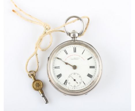 A silver J.G. Graves key wind open face pocket watch, the white enamel dial having hourly Roman numeral markers with minute t