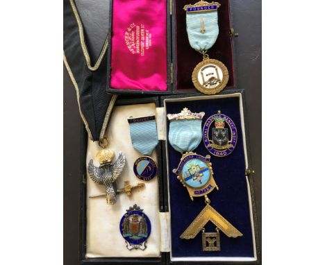 Five various Masonic medals, some enamel on silver and one Scottish Masonic ribbon medal. 