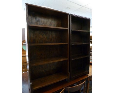 AN OAK FOUR TIER OPEN BOOKCASE, 2; WIDE, 3' 7"HIGH, SMALLER OAK AND PLY PANEL BOOKCASE, 1' 7" WIDE, 3'7" HIGH AND A WICKER SQ