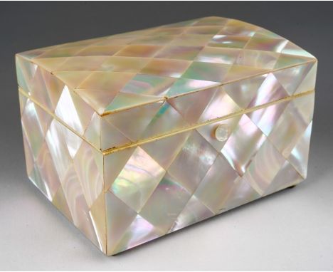 A Georgian style mother-of-pearl veneered tea caddy, lined with single cover to interior, on stud feet., A Jungerhams Rotterd