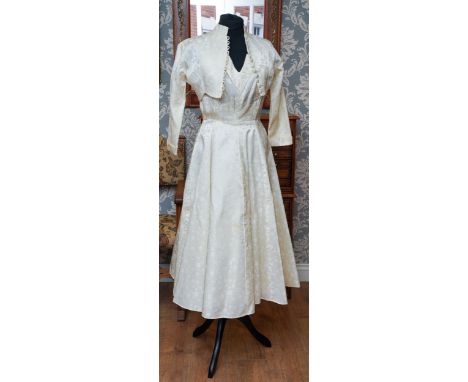 1950's satin brocade tea length wedding dress, boned bodice, bolero jacket with looped button holes, 3/4 sleeves