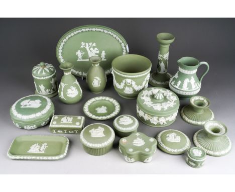 A collection of nineteen pieces of 20th century Wedgwood green jasperware, including a pair of dwarf candlesticks, a small pl