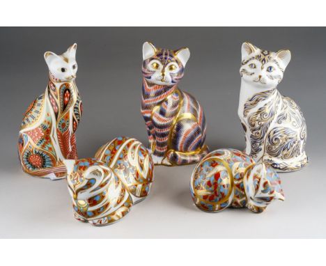 Five Royal Crown Derby paperweights in the form of cats and a kitten, comprising Siamese Cat, limited edition Majestic Cat no