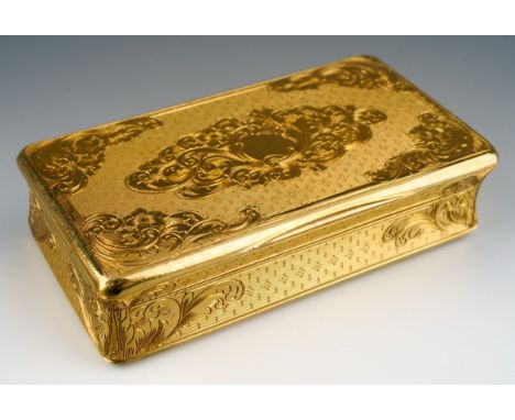 An late 19th century trinket box. The rectangular case with hinged lid, engine turned and scrolling surface detail, inner rim