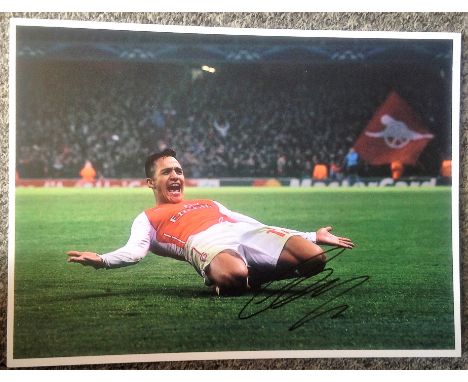 Football Alexis Sanchez signed 16x12 colour photo pictured celebrating while playing for Arsenal. Good Condition. All autogra