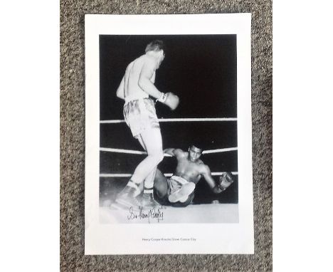 Boxing Sir Henry Cooper 20x14 signed black and white print picturing the moment when Henry Cooper knocked down Cassius Clay d