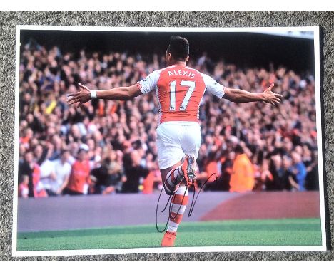 Football Alexis Sanchez signed 16x12 colour photo pictured celebrating while playing for Arsenal. Good Condition. All autogra