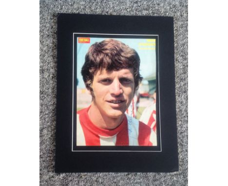 Football Mike Channon signed 16x12 mounted colour magazine page pictured while playing for Southampton. Good Condition. All a