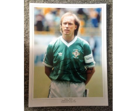 Football Sammy Mcllroy signed 16x12 colour photo pictured while playing for Northern Ireland. Good Condition. All autographs 