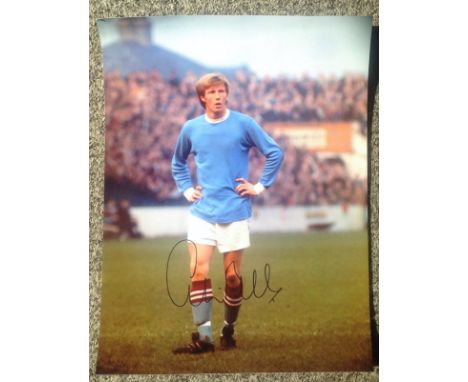 Football Colin Bell signed 16x12 colour photo pictured while playing for Manchester City. Good Condition. All autographs are 