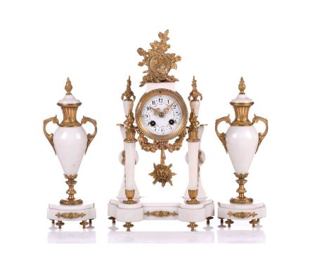 A Louis XVI-style white marble and ormolu 8-day clock garniture, early 20th century, fitted with a silvered Societe Clusienne