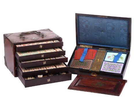 A Victorian coromandel and brass mounted games box, by Edwards and Jones, with fleur-de-lys design top, enclosing a gilt meta