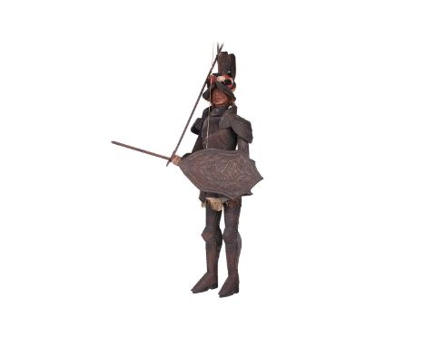 A lar 20th-century Sicilian style rod and cord puppet of a renaissance knight in plate armour, with painted features and hold
