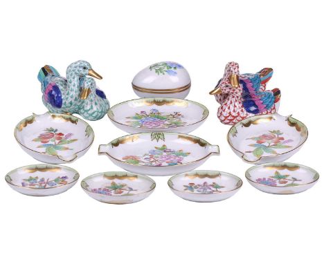 A collection of Herend Porcelain items, comprising two pairs of ducks, (10 cm wide), a covered box and two sets of four pin d