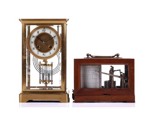 An early 20th-century French "four-glass" mantle clock in a simple gilt brass ogee case, the 8-day movement chiming the hours